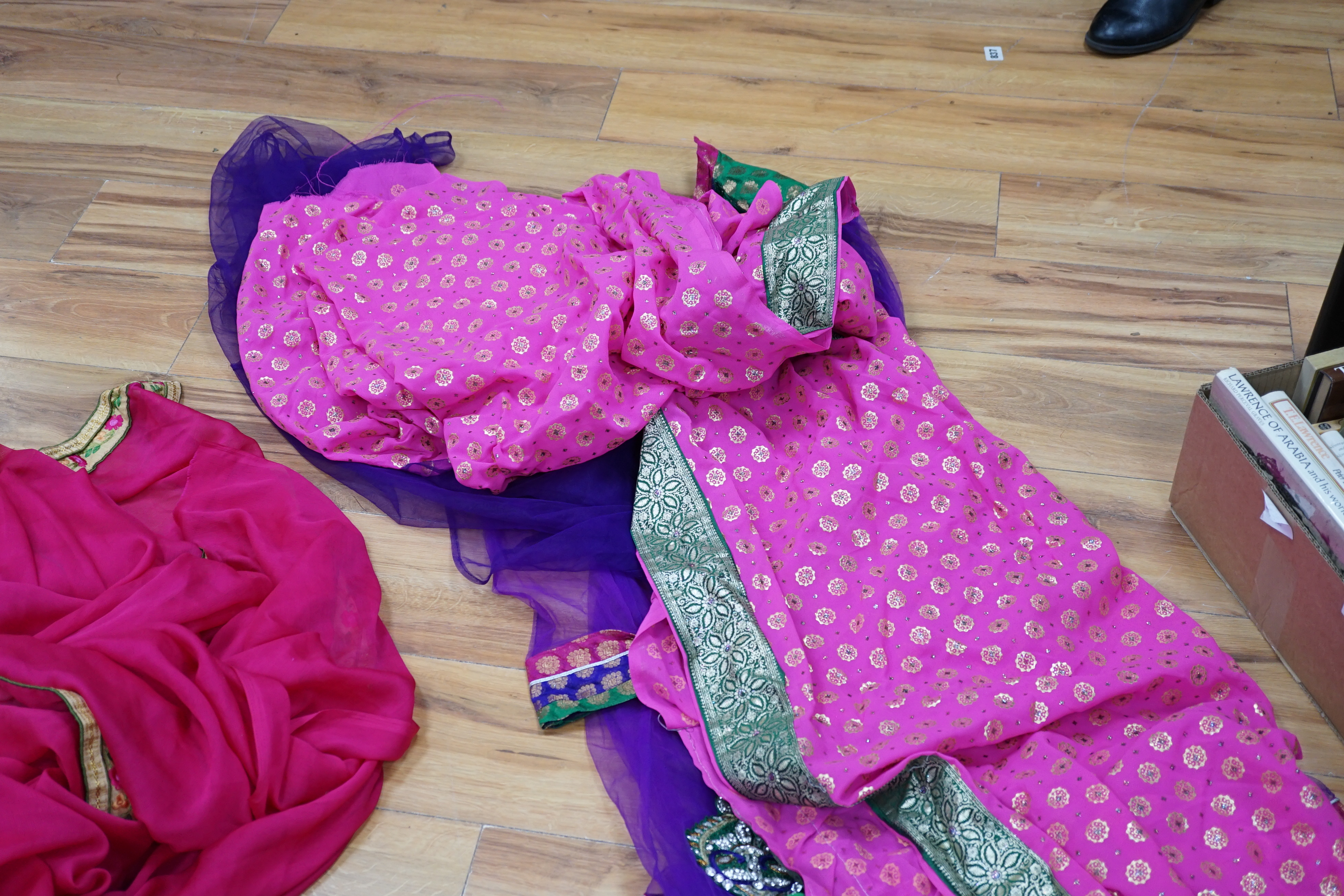 A collection of Indian silk saris and costume possibly bridal